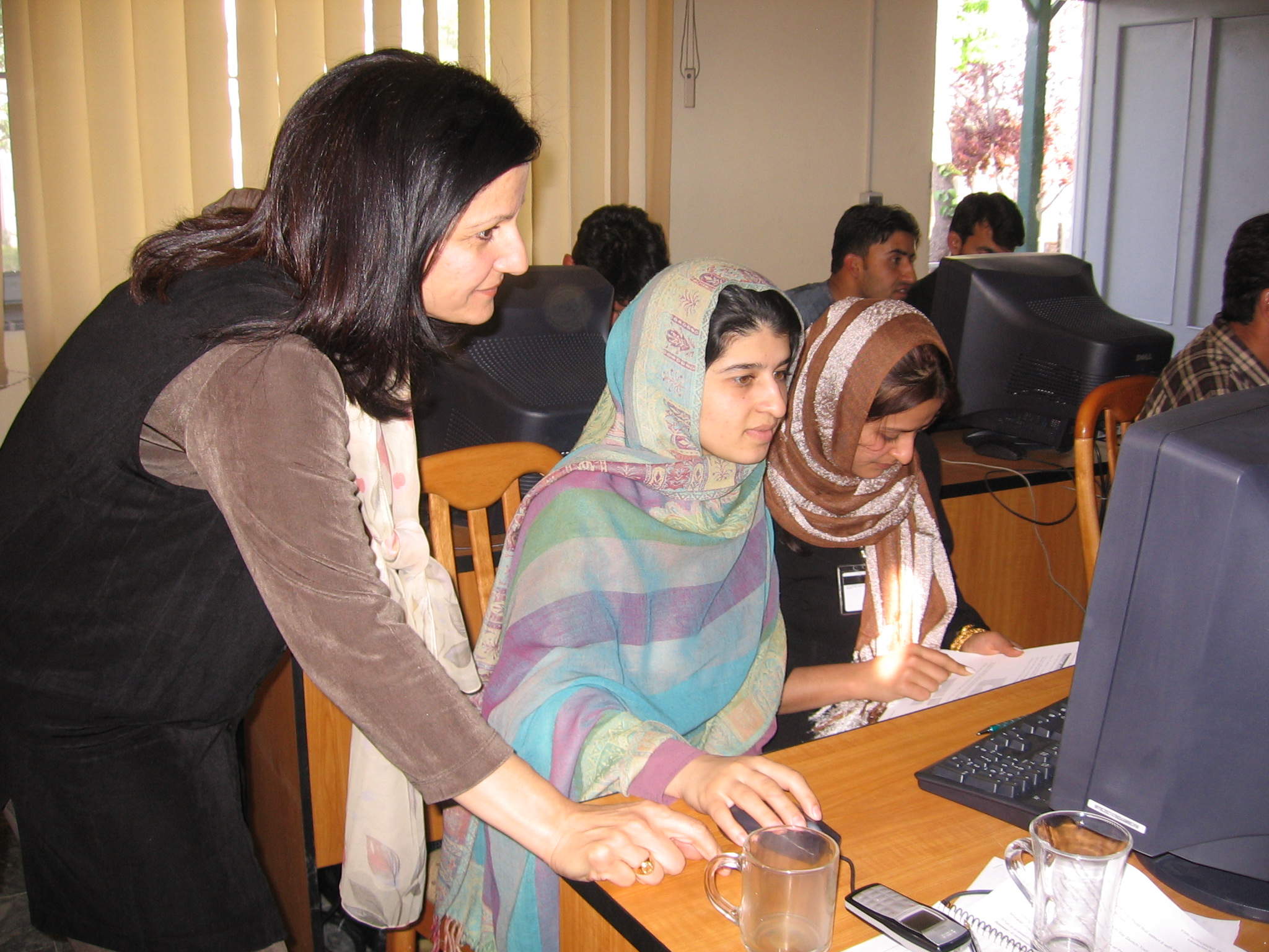 AIMS Staff At A Hands-on Workshop In Afghanistan